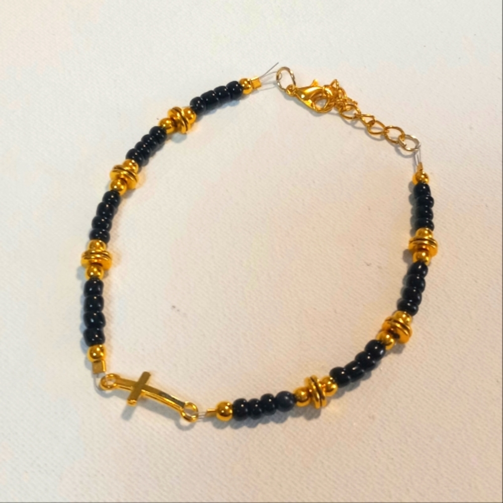 Black Beaded Cross Bracelet with Gold Accents